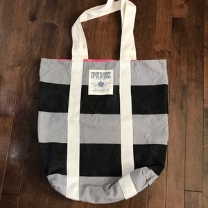 PINK tote bag, gray and black with cream handles, pink interior